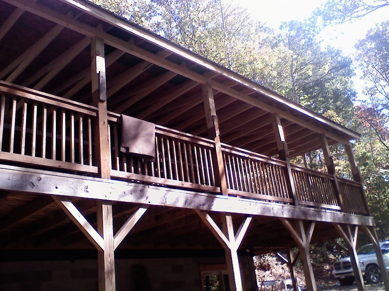 Timber framing under a new elevated porch and deck — Roof Leak Repair in Brush Creek by Roofing Brothers